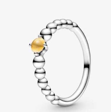 Anello PANDORA color miele decorato con sfere - Biondo Gioielli